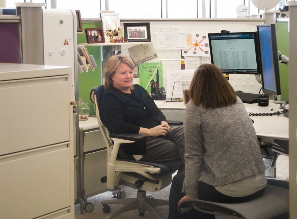 Assurity Employee at their desk