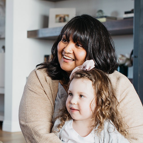 Lorena from Underwriting with granddaughter