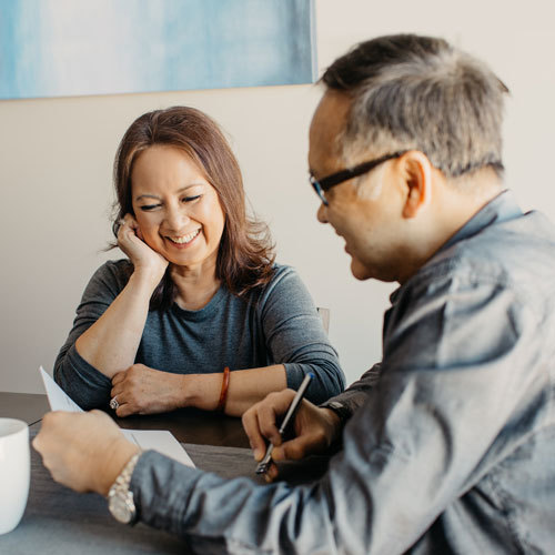 Thuy from Underwriting with husband
