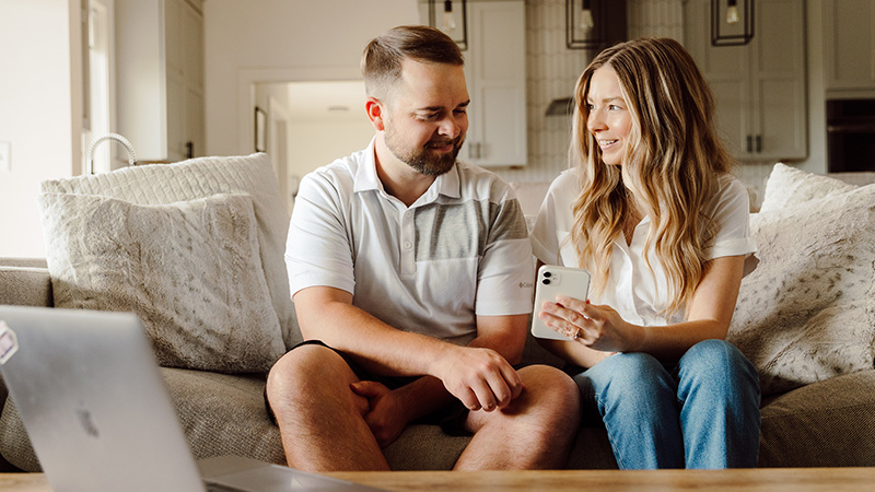 Assurity associate Hilary and her husband looking at life insurance options